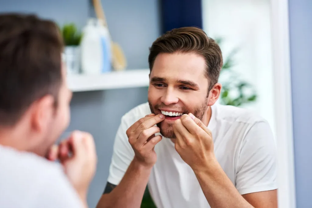 Flossing should begin as soon as your child has two teeth that touch each other.